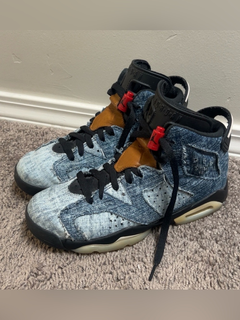 Jordan Denim Sneakers in Light Blue. Fits women’s size 7 or kids size 5Y.